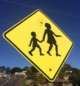 Road sign with feet